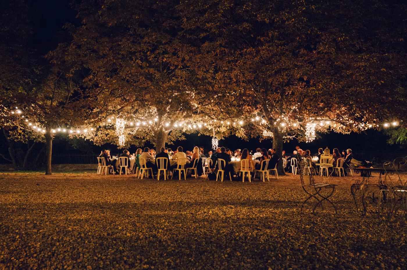 Guests gathered at an outdoor ceremony setting