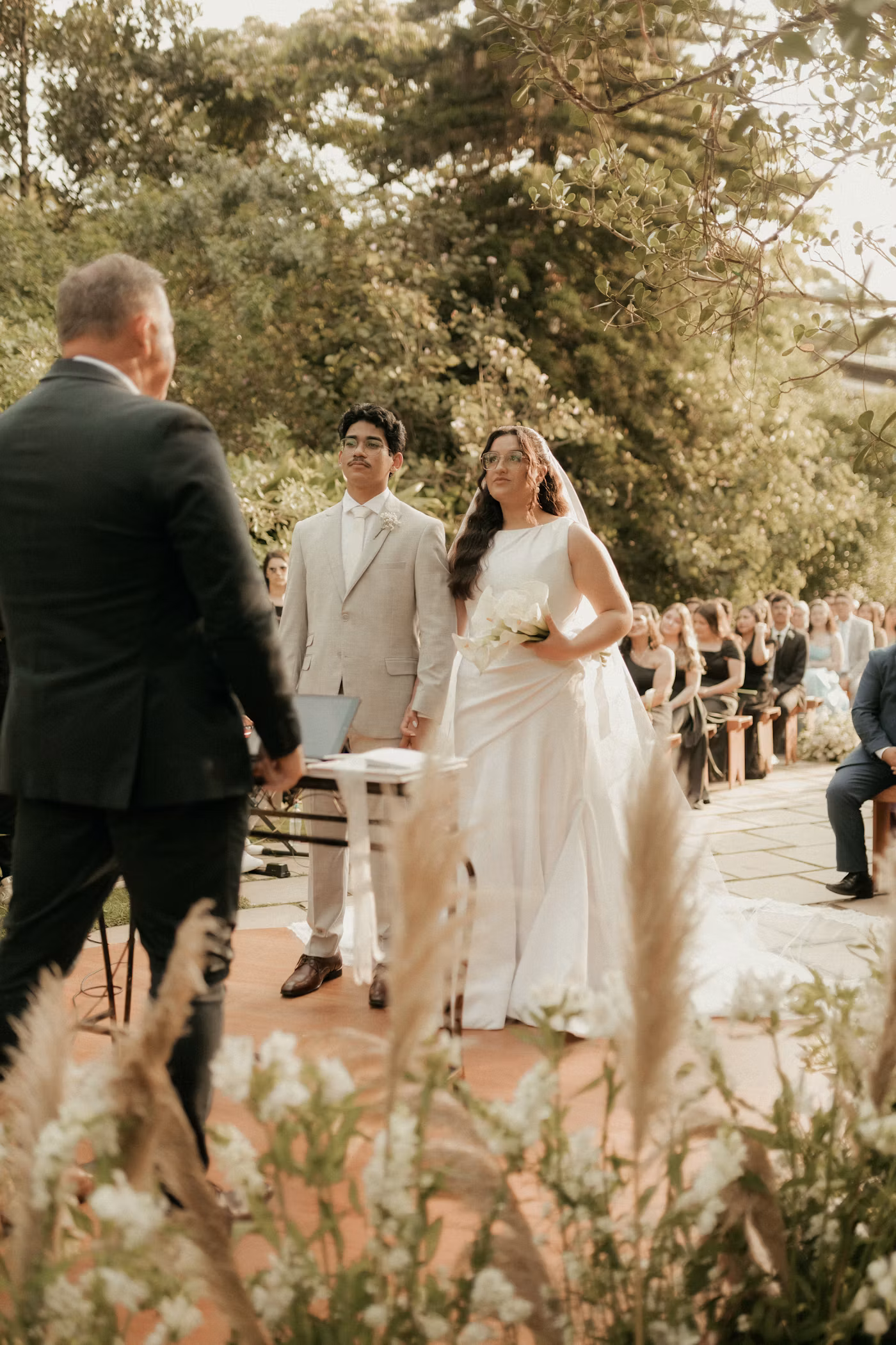 Guests gathered at an outdoor ceremony