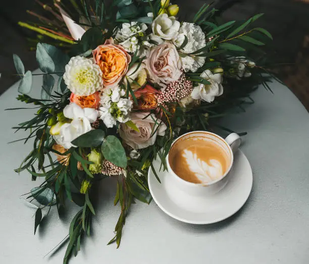 Flowers and coffee the morning after a wedding